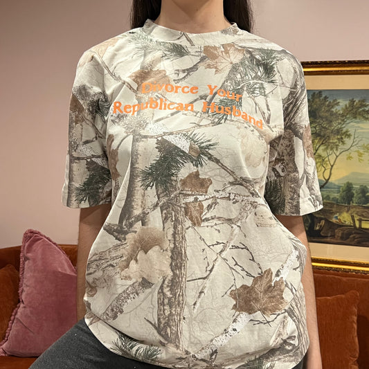 DIVORCE YOUR REPUBLICAN HUSBAND white camo t-shirt with orange text (M)