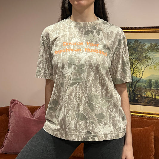 DIVORCE YOUR REPUBLICAN HUSBAND camo t-shirt with orange text (S)