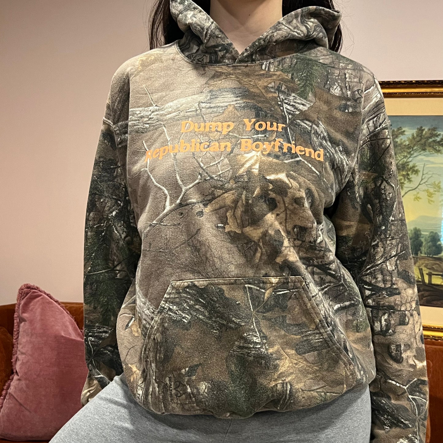 DUMP YOUR REPUBLICAN BOYFRIEND camo hoodie with orange text (M)