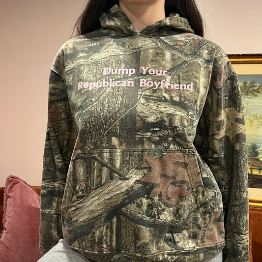 DUMP YOUR REPUBLICAN BOYFRIEND camo hoodie with pink text (M)