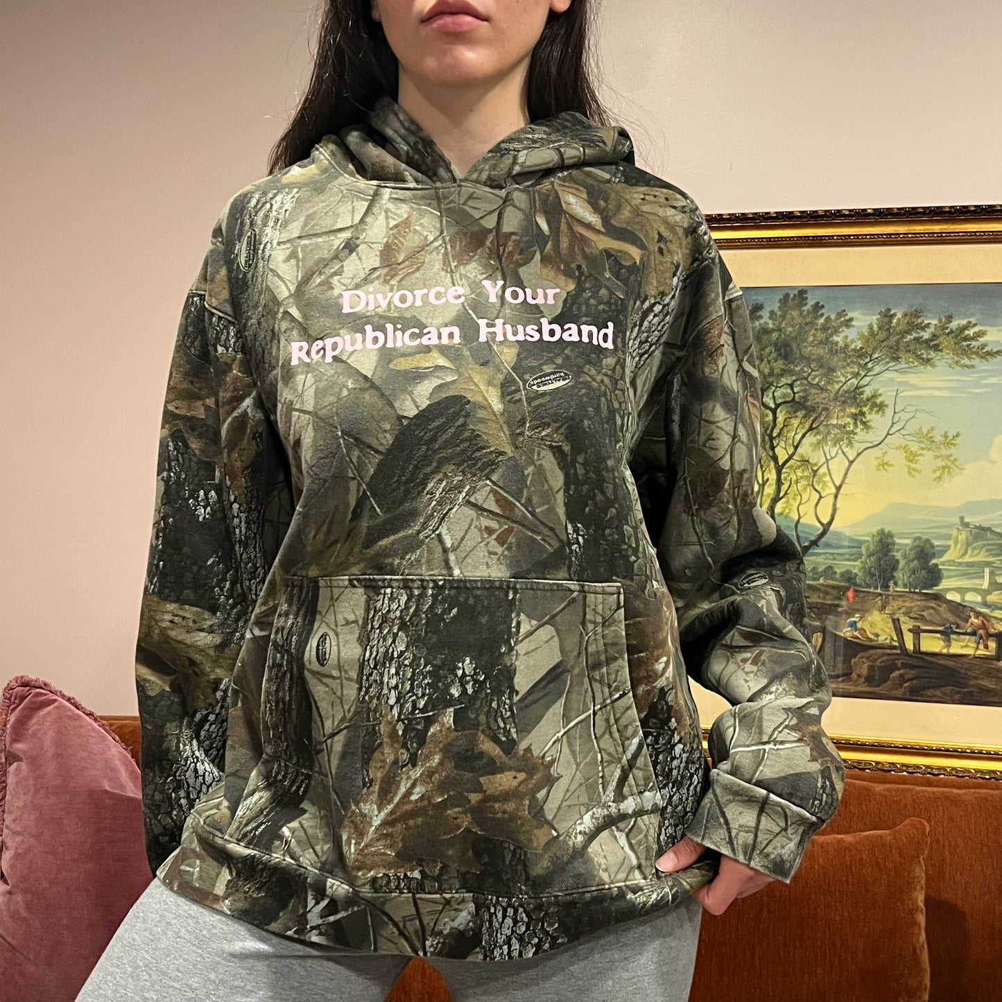 DIVORCE YOUR REPUBLICAN HUSBAND camo hoodie with pink text (XL)