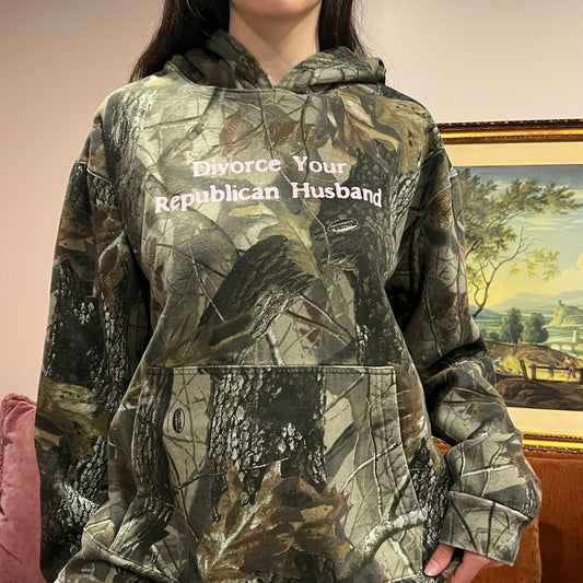 DIVORCE YOUR REPUBLICAN HUSBAND camo hoodie with pink text (XL)