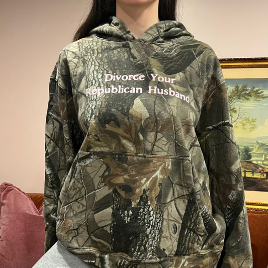 DIVORCE YOUR REPUBLICAN HUSBAND camo hoodie with pink text (L)