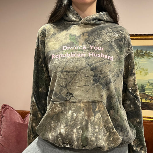 DIVORCE YOUR REPUBLICAN HUSBAND camo hoodie with pink text (L)