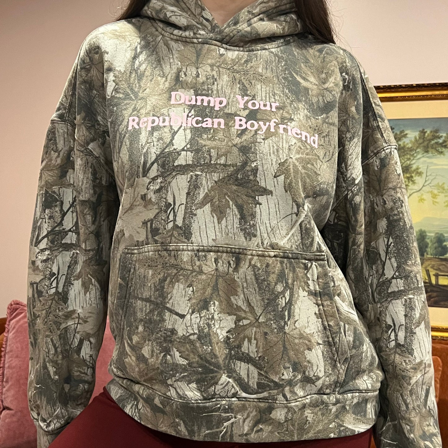 DUMP YOUR REPUBLICAN BOYFRIEND camo hoodie with pink text (M)