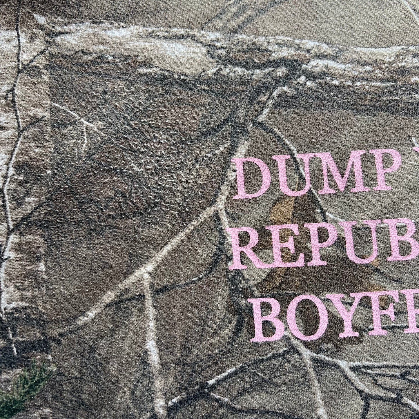 DUMP YOUR REPUBLICAN BOYFRIEND camo hoodie with pink text (XL)