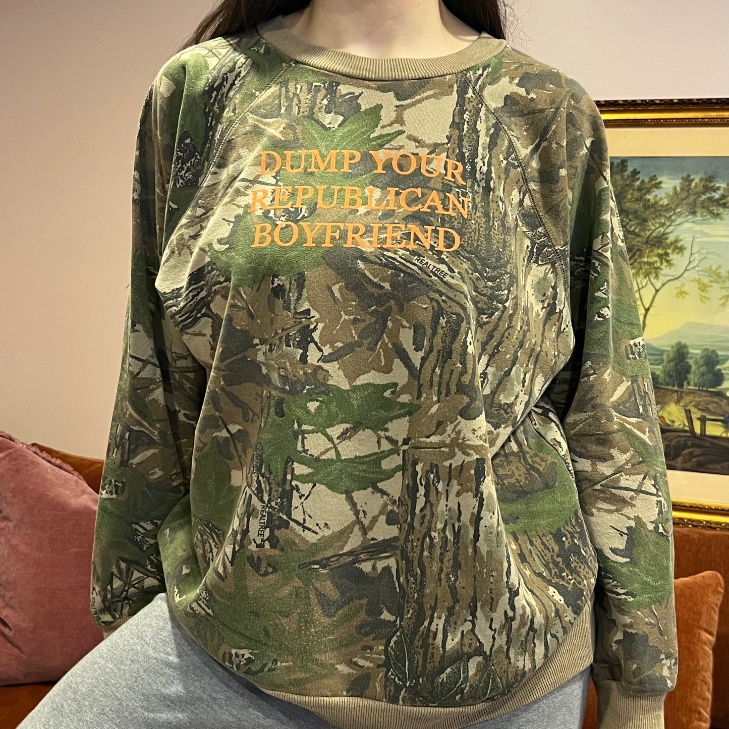 DUMP YOUR REPUBLICAN BOYFRIEND camo crewneck with orange text (XL)