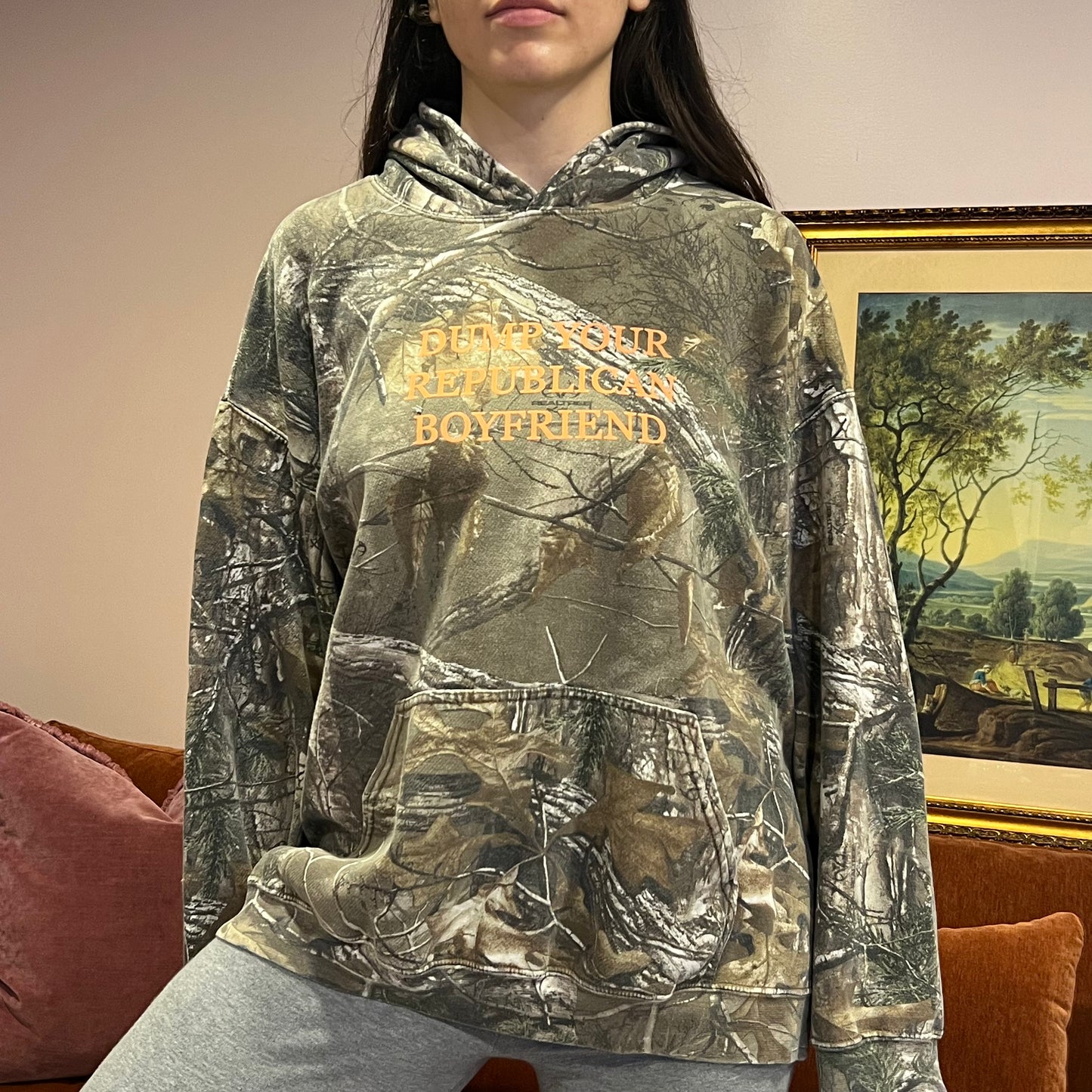 DUMP YOUR REPUBLICAN BOYFRIEND camo hoodie with orange text (XL)