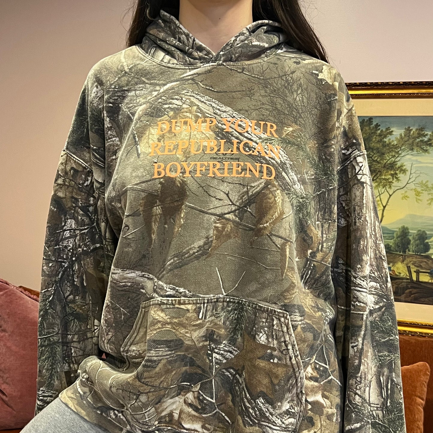 DUMP YOUR REPUBLICAN BOYFRIEND camo hoodie with orange text (XL)