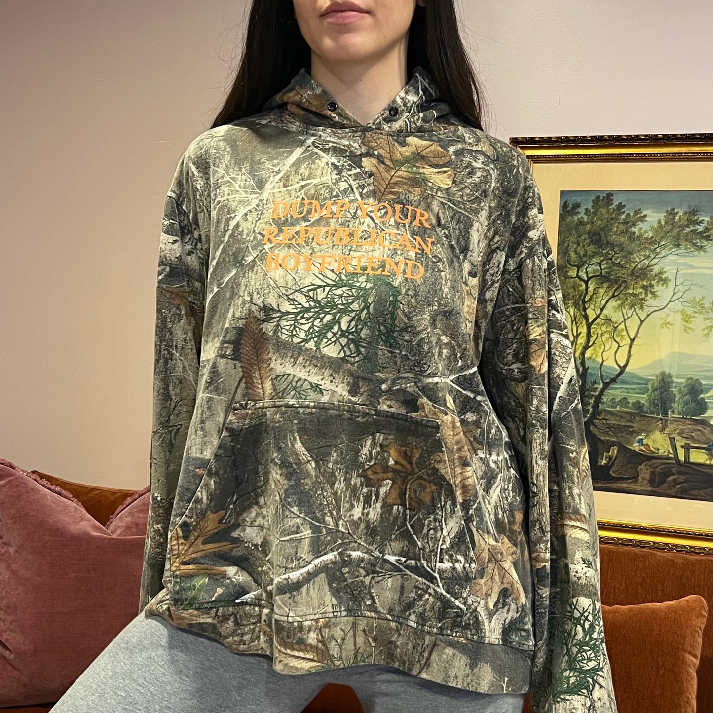 DUMP YOUR REPUBLICAN BOYFRIEND camo hoodie with orange text (XL)
