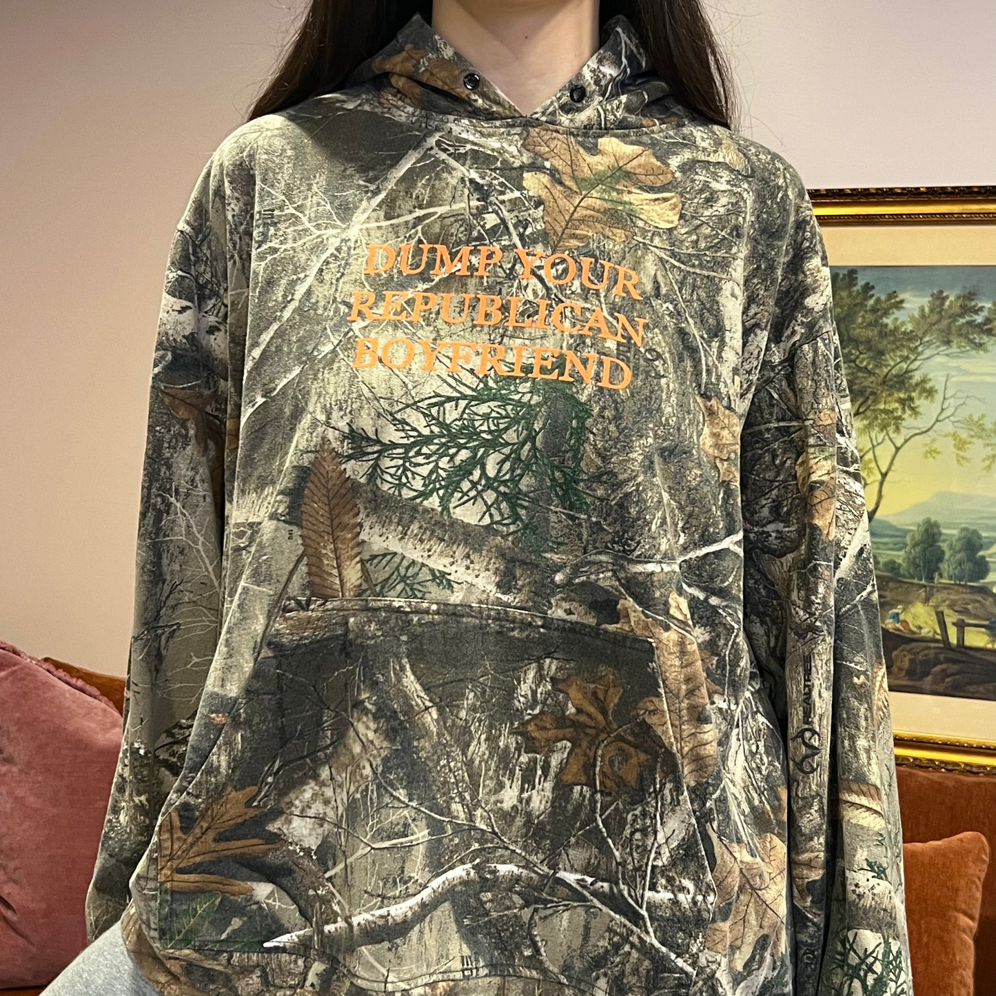 DUMP YOUR REPUBLICAN BOYFRIEND camo hoodie with orange text (XL)