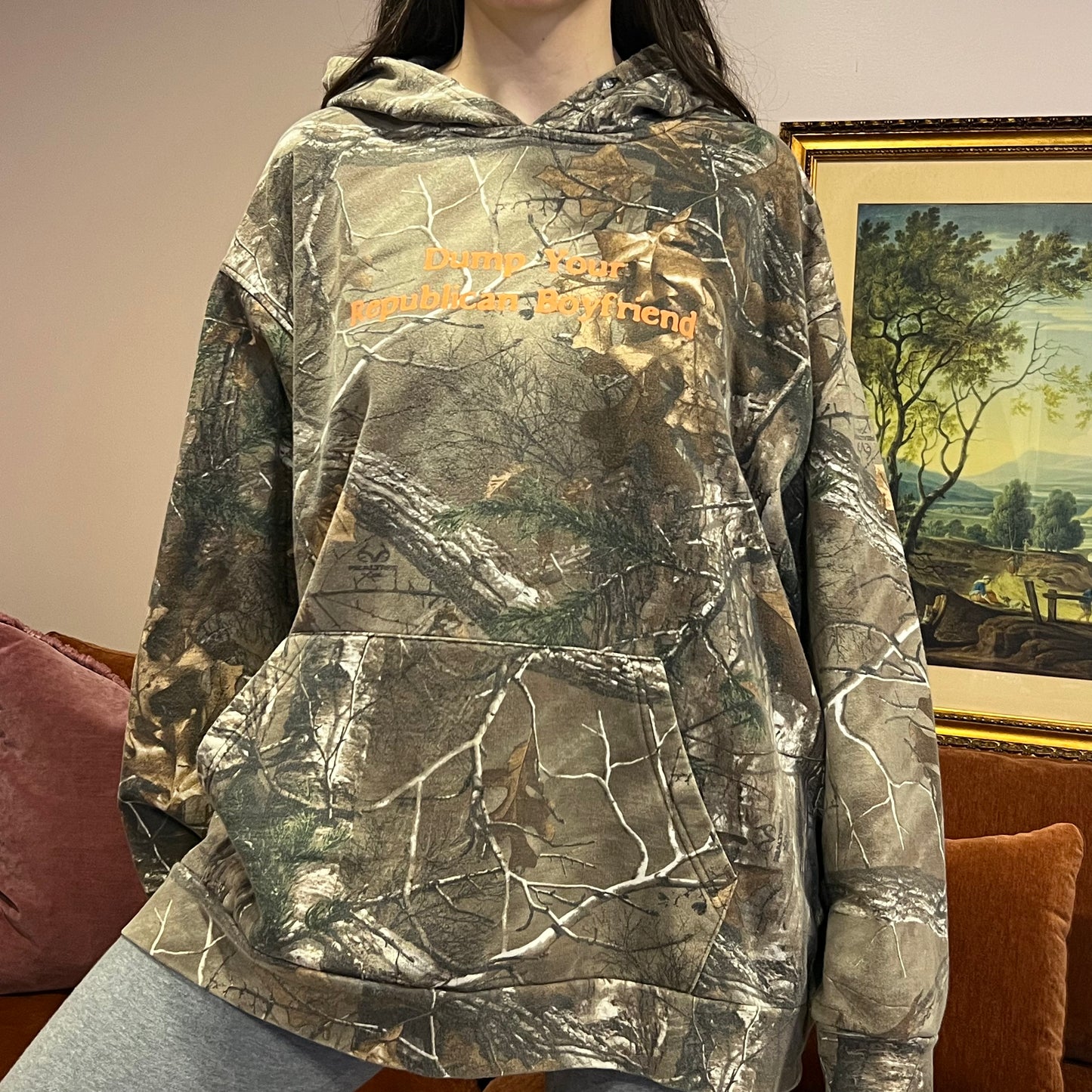 DUMP YOUR REPUBLICAN BOYFRIEND camo hoodie with orange text (2XL)