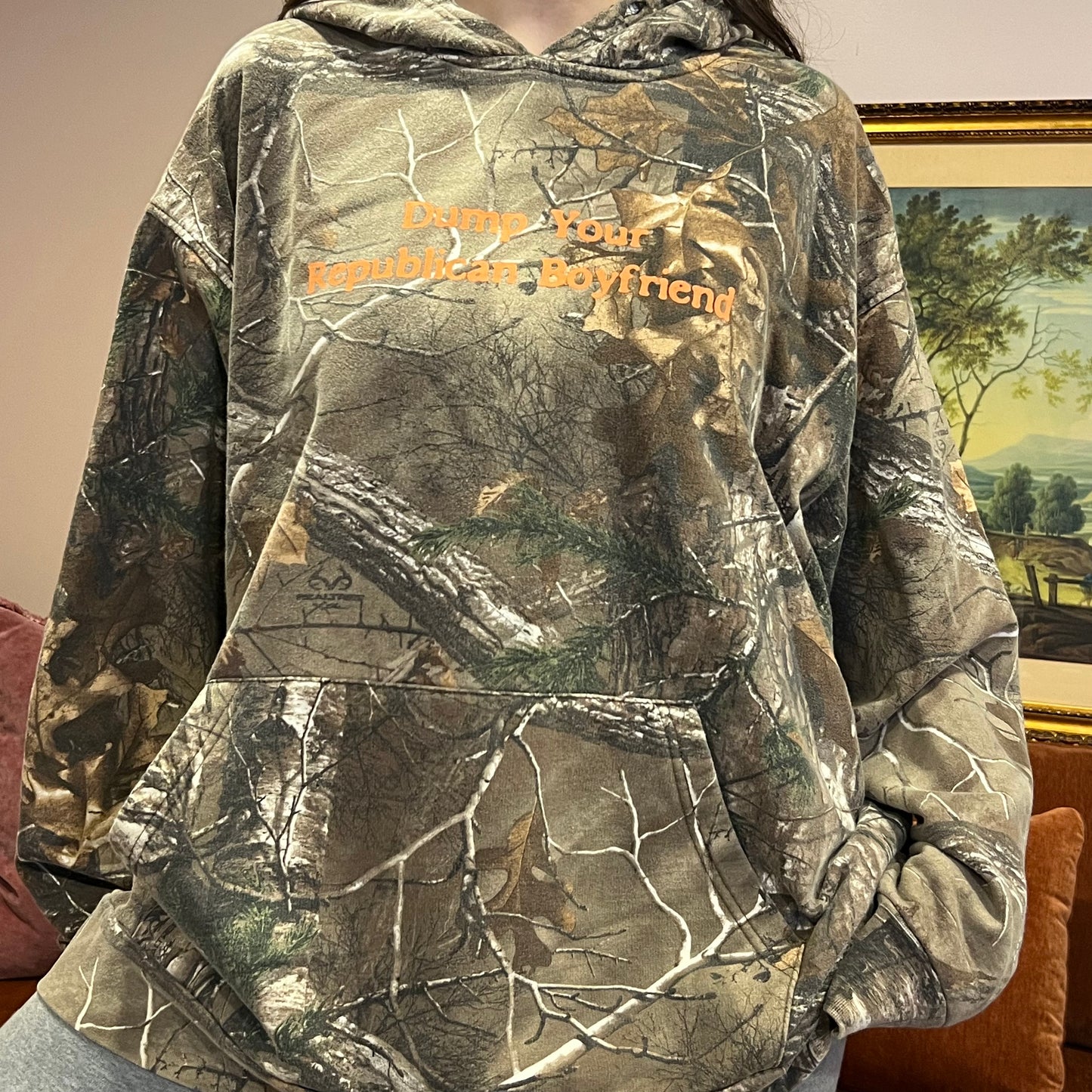 DUMP YOUR REPUBLICAN BOYFRIEND camo hoodie with orange text (2XL)