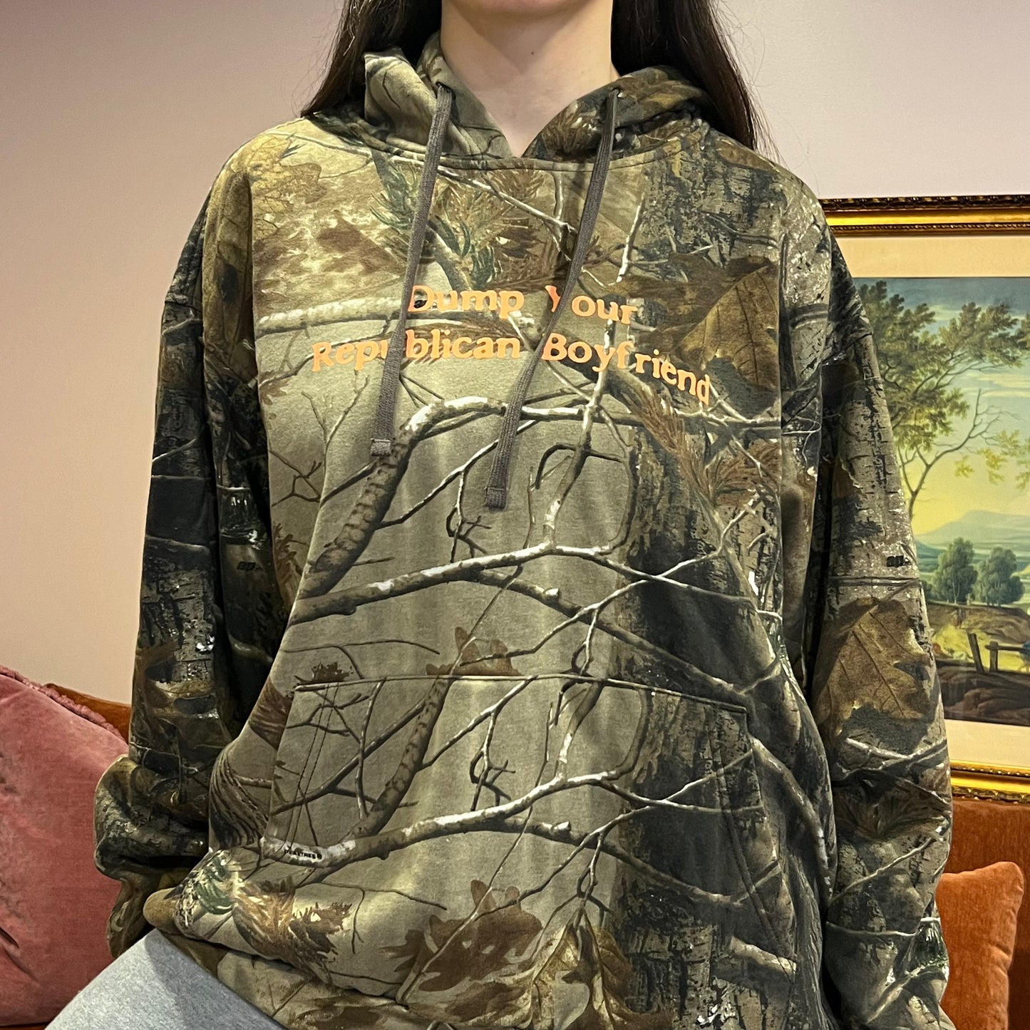 DUMP YOUR REPUBLICAN BOYFRIEND camo hoodie with orange text (XL)