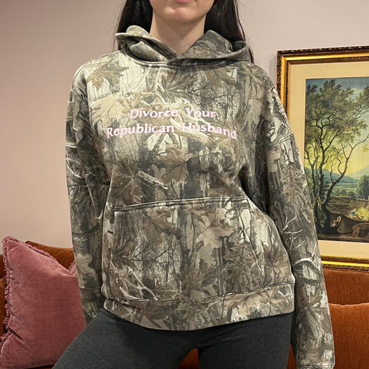 DIVORCE YOUR REPUBLICAN HUSBAND camo hoodie with pink text (M)