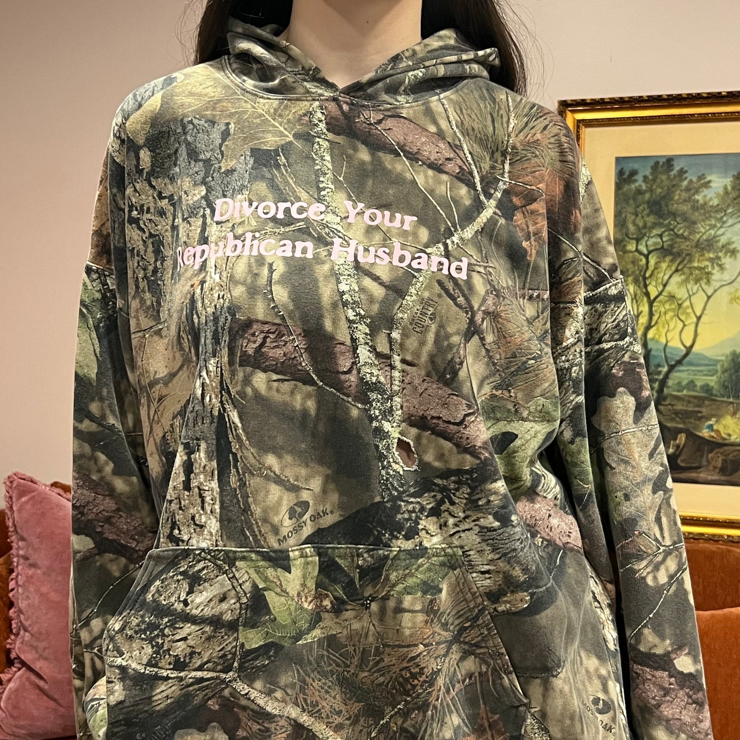 DIVORCE YOUR REPUBLICAN HUSBAND camo hoodie with pink text (XL)