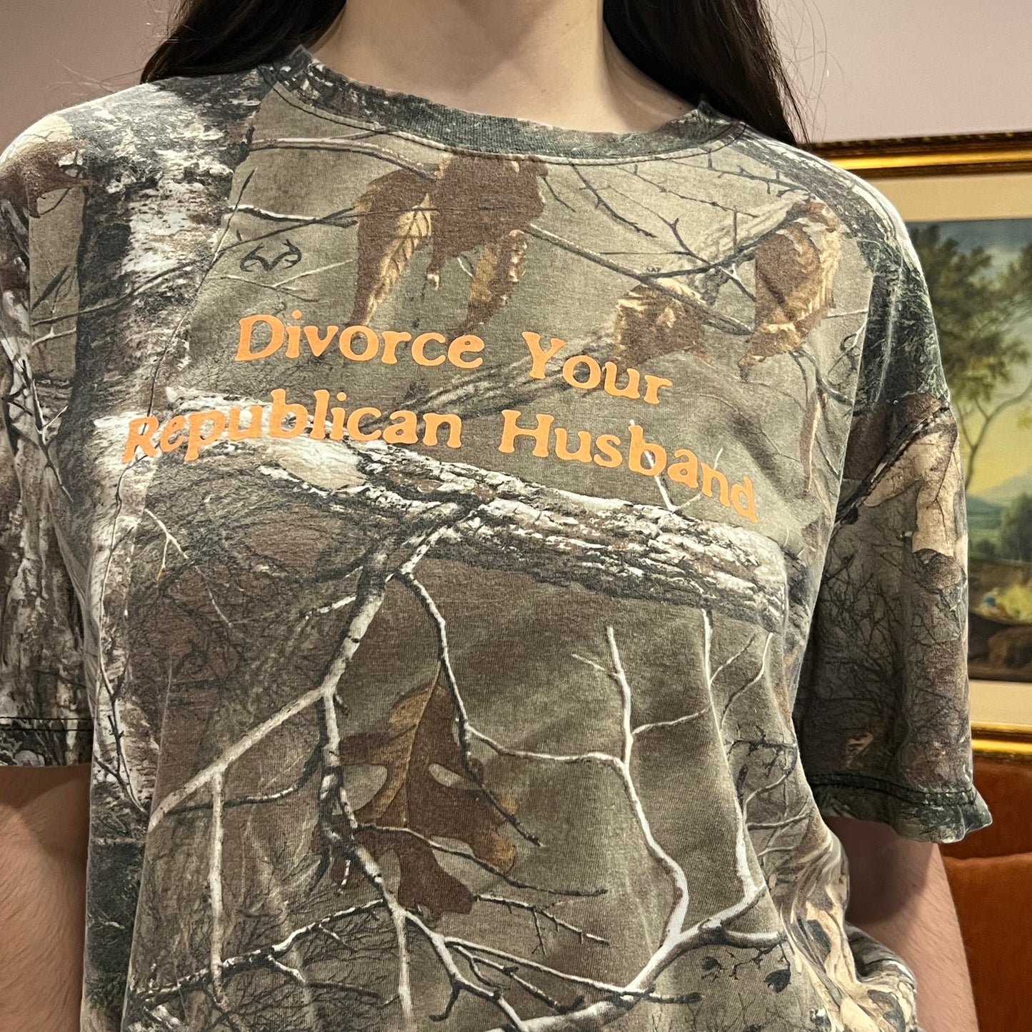 DIVORCE YOUR REPUBLICAN HUSBAND camo t-shirt with orange text (XL)