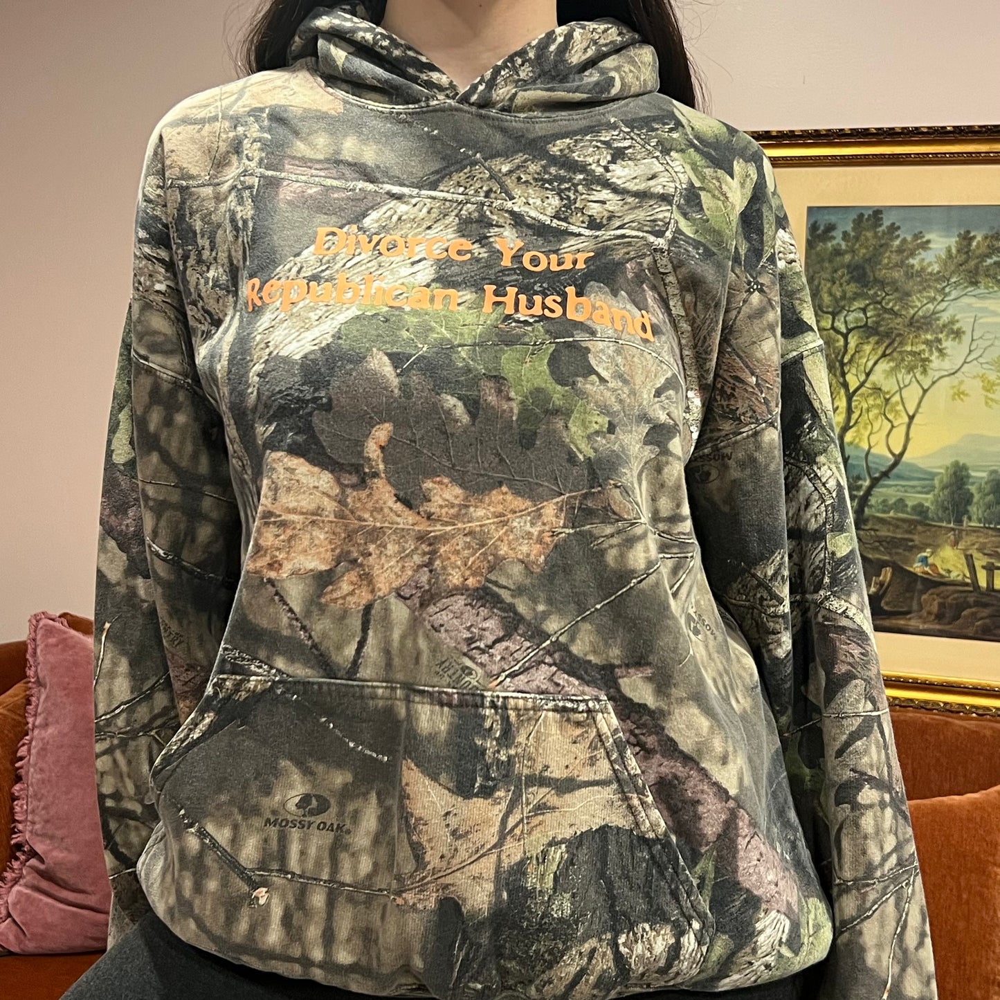 DIVORCE YOUR REPUBLICAN HUSBAND camo hoodie with orange text (XL)