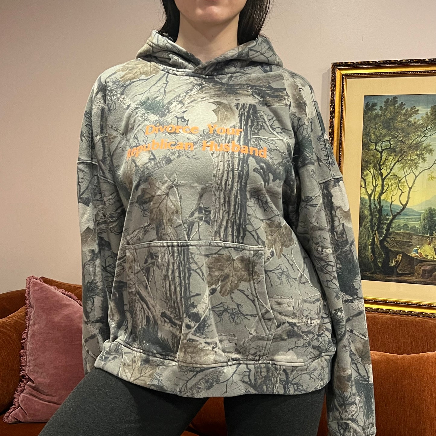 DIVORCE YOUR REPUBLICAN HUSBAND camo hoodie with orange text (XL)