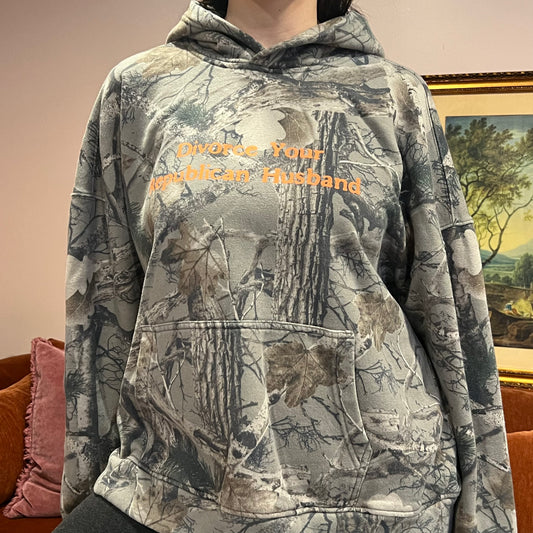 DIVORCE YOUR REPUBLICAN HUSBAND camo hoodie with orange text (XL)