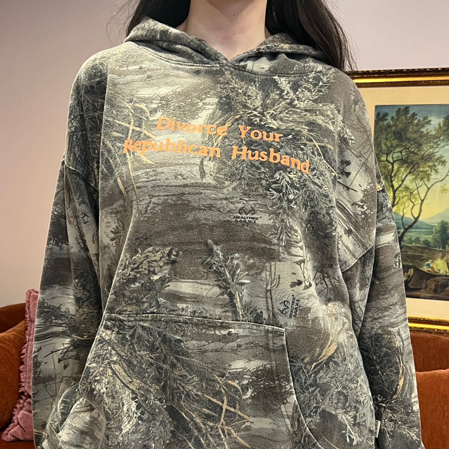 DIVORCE YOUR REPUBLICAN HUSBAND camo hoodie with orange text (XL)