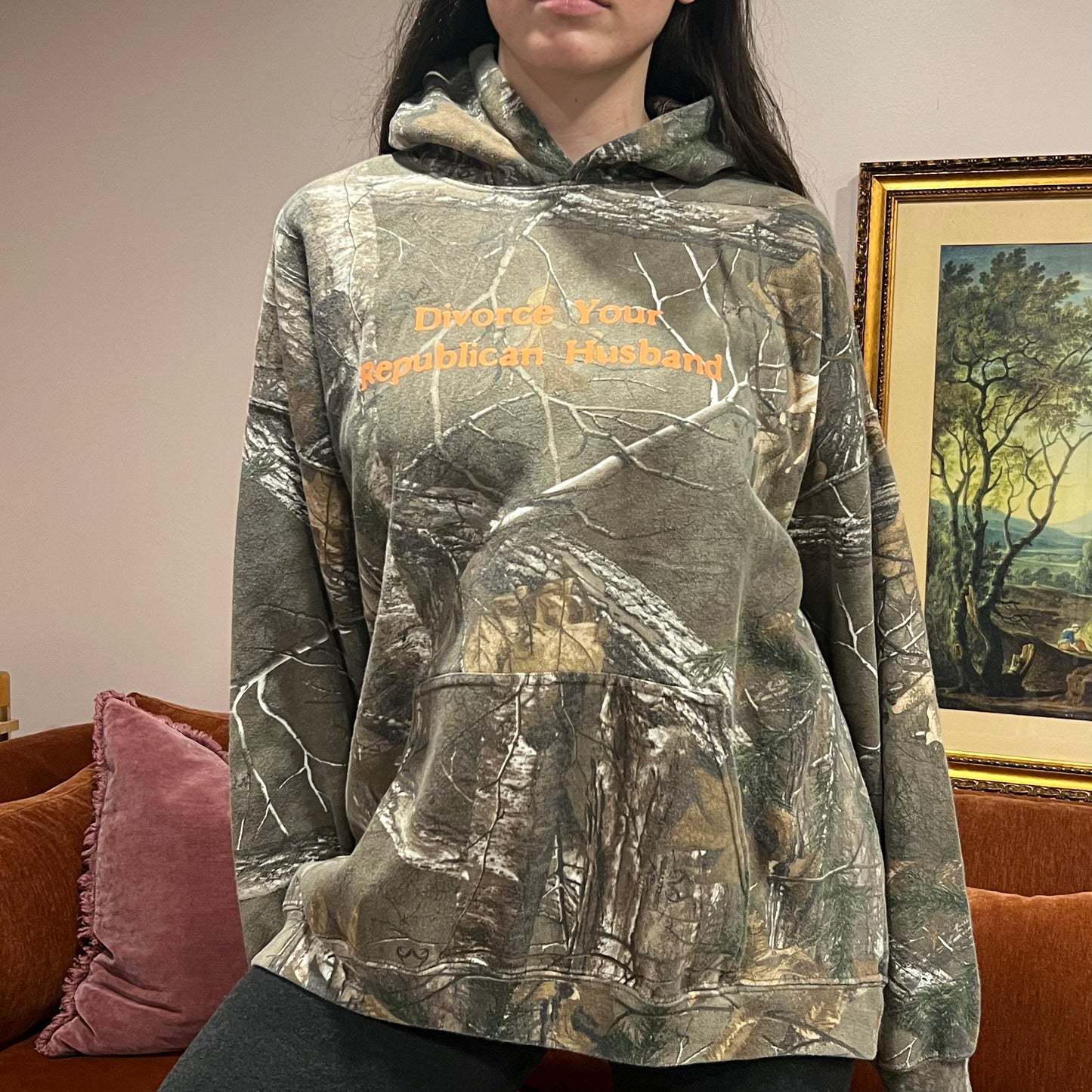 DIVORCE YOUR REPUBLICAN HUSBAND camo hoodie with orange text (XL)