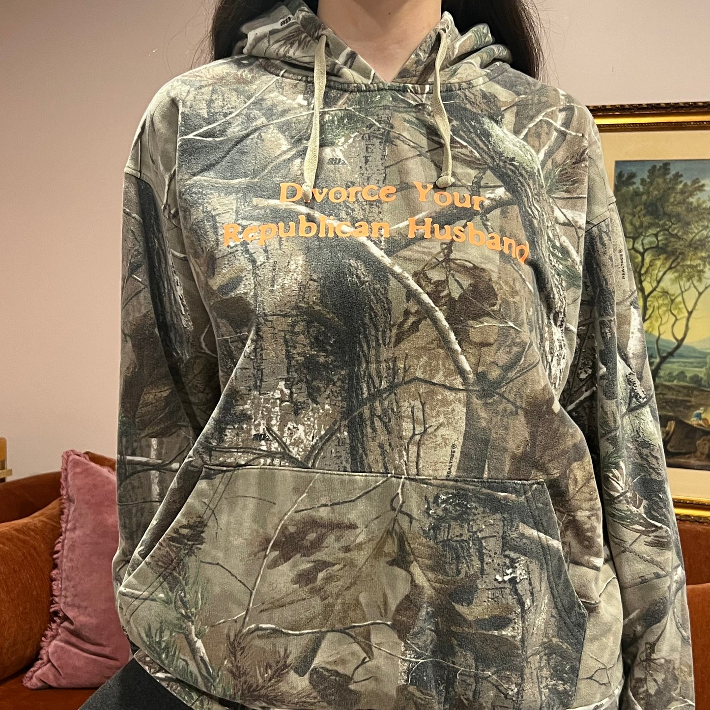 DIVORCE YOUR REPUBLICAN HUSBAND camo hoodie with orange text (XL)