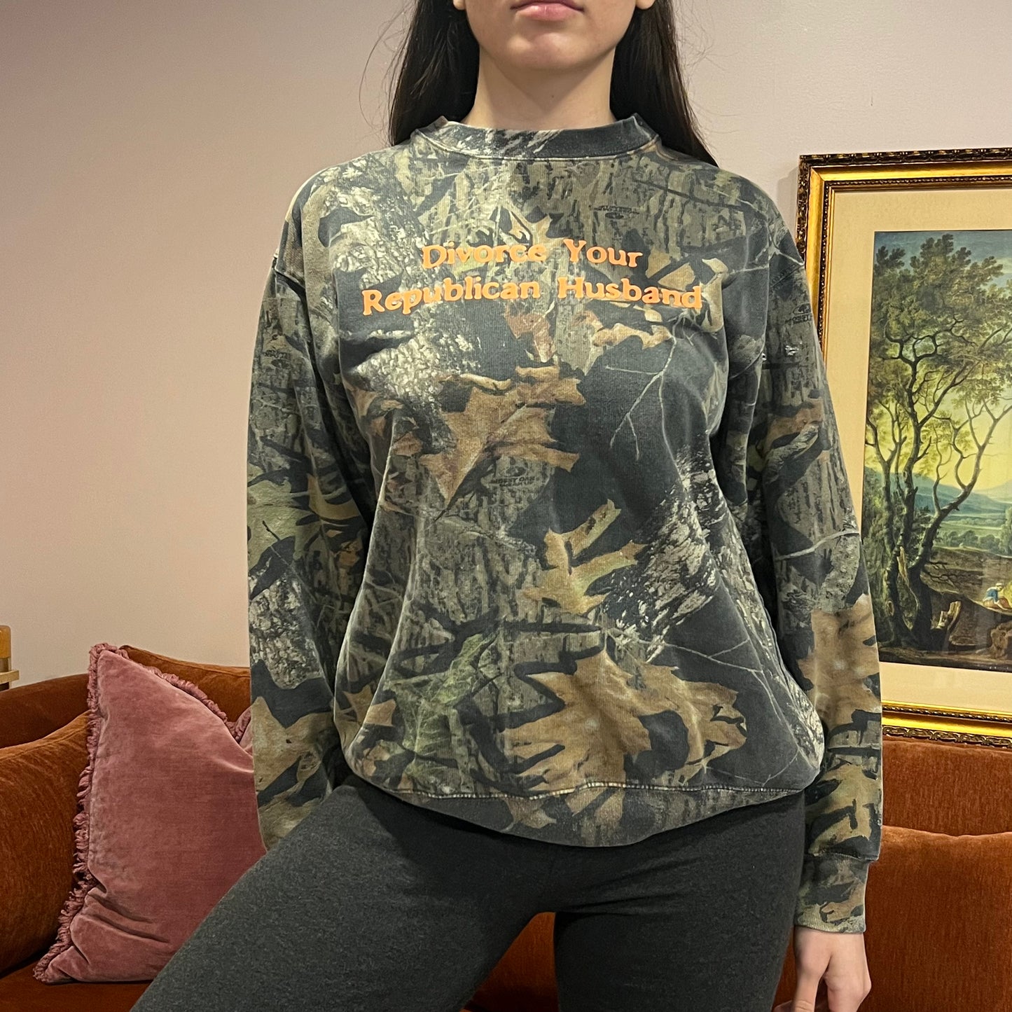 DIVORCE YOUR REPUBLICAN HUSBAND camo crewneck with orange text (L)