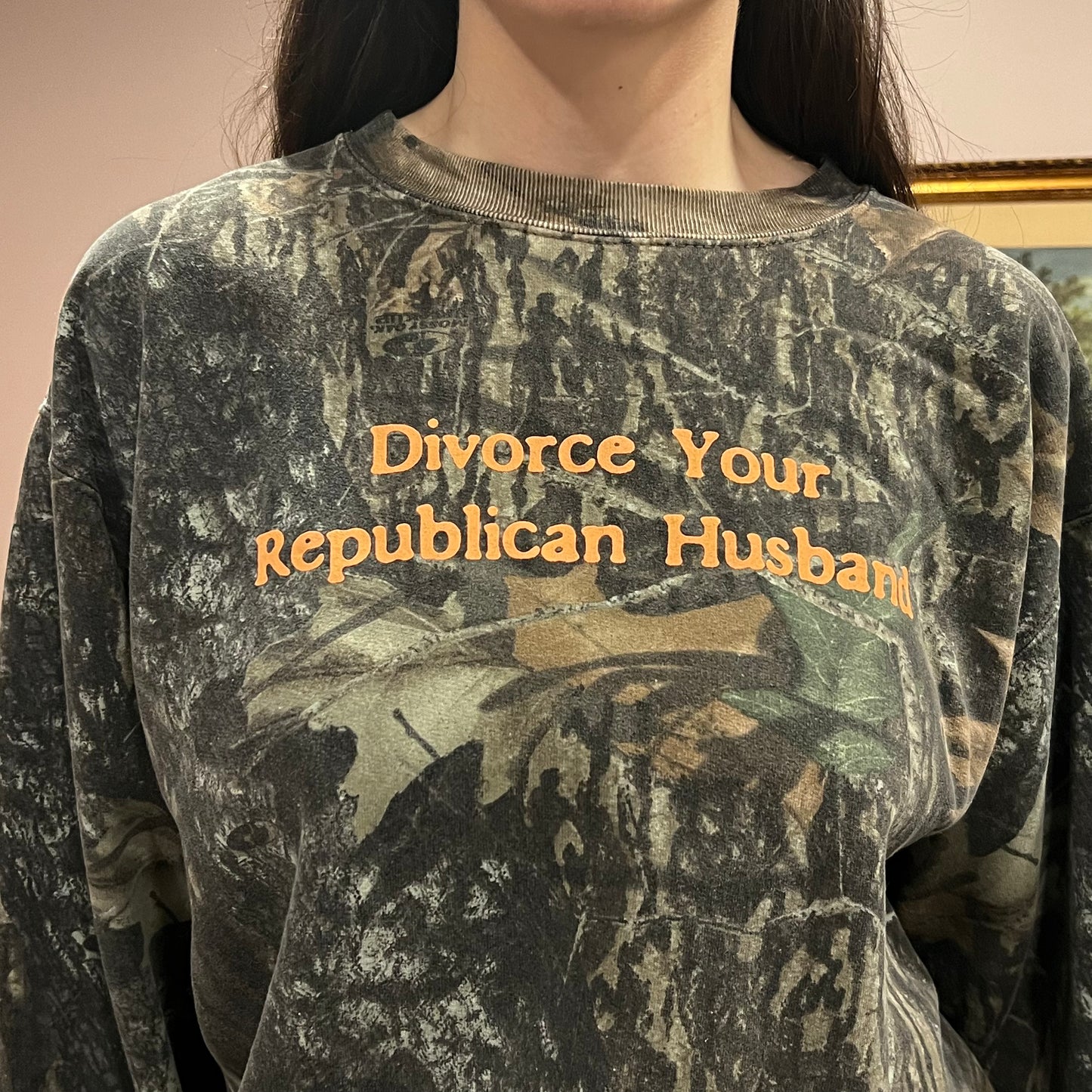 DIVORCE YOUR REPUBLICAN HUSBAND camo crewneck with orange text (XL)