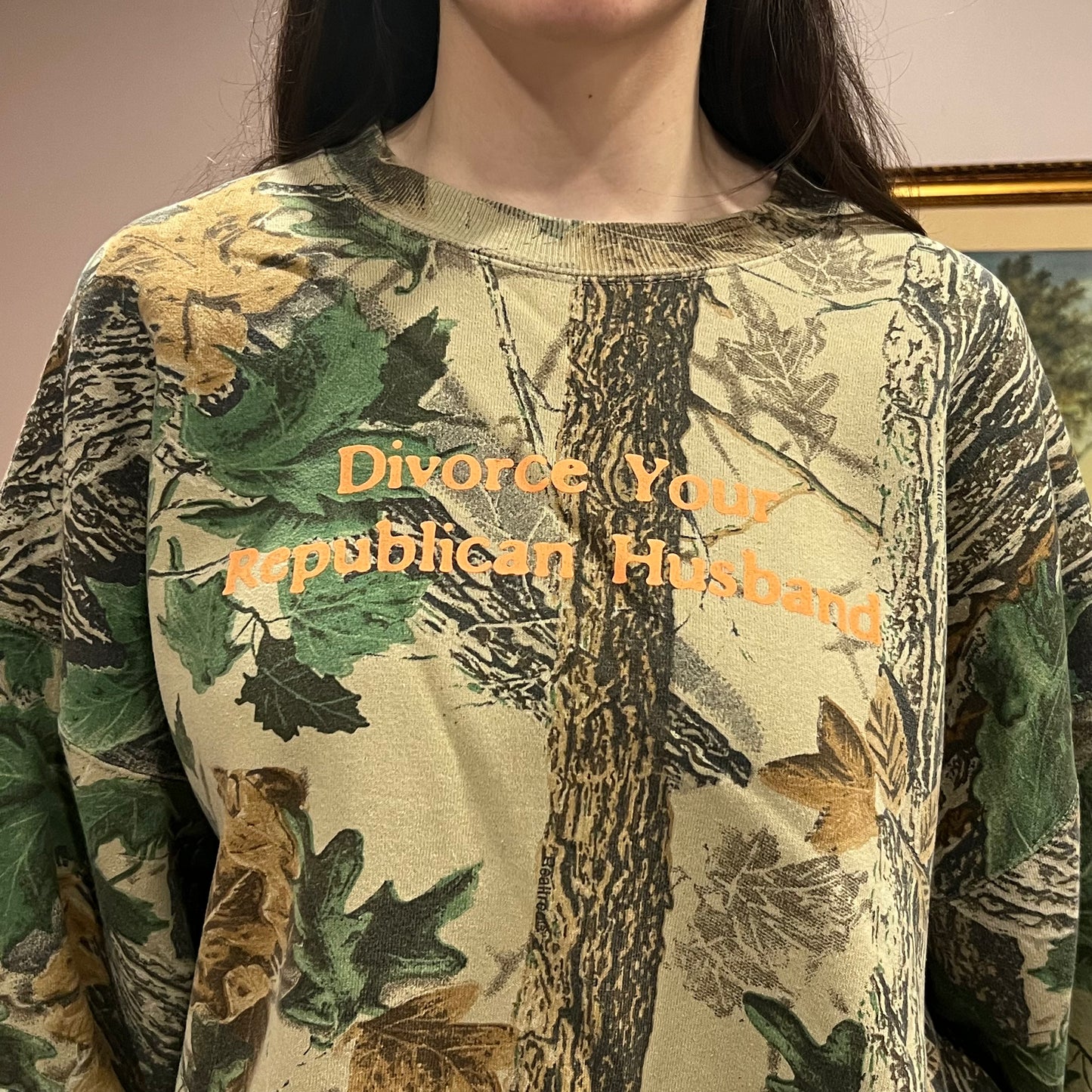 DIVORCE YOUR REPUBLICAN HUSBAND camo crewneck with orange text (3XL)