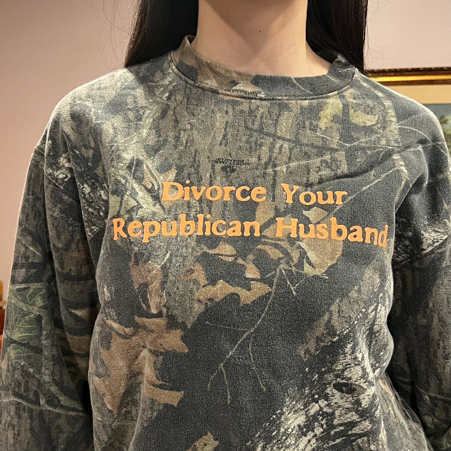DIVORCE YOUR REPUBLICAN HUSBAND camo crewneck with orange text (M)