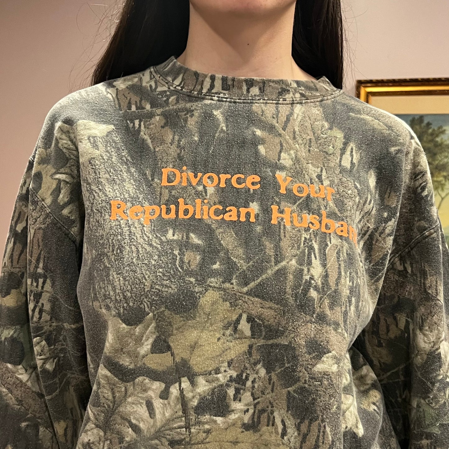 DIVORCE YOUR REPUBLICAN HUSBAND camo crewneck with orange text (L)
