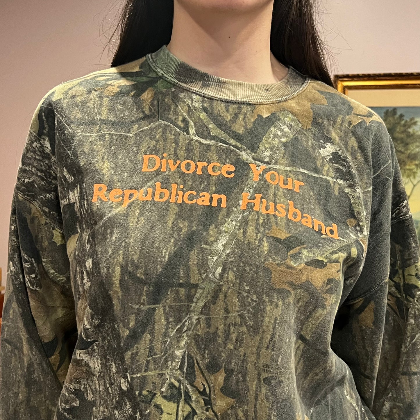 DIVORCE YOUR REPUBLICAN HUSBAND camo crewneck with orange text (L)