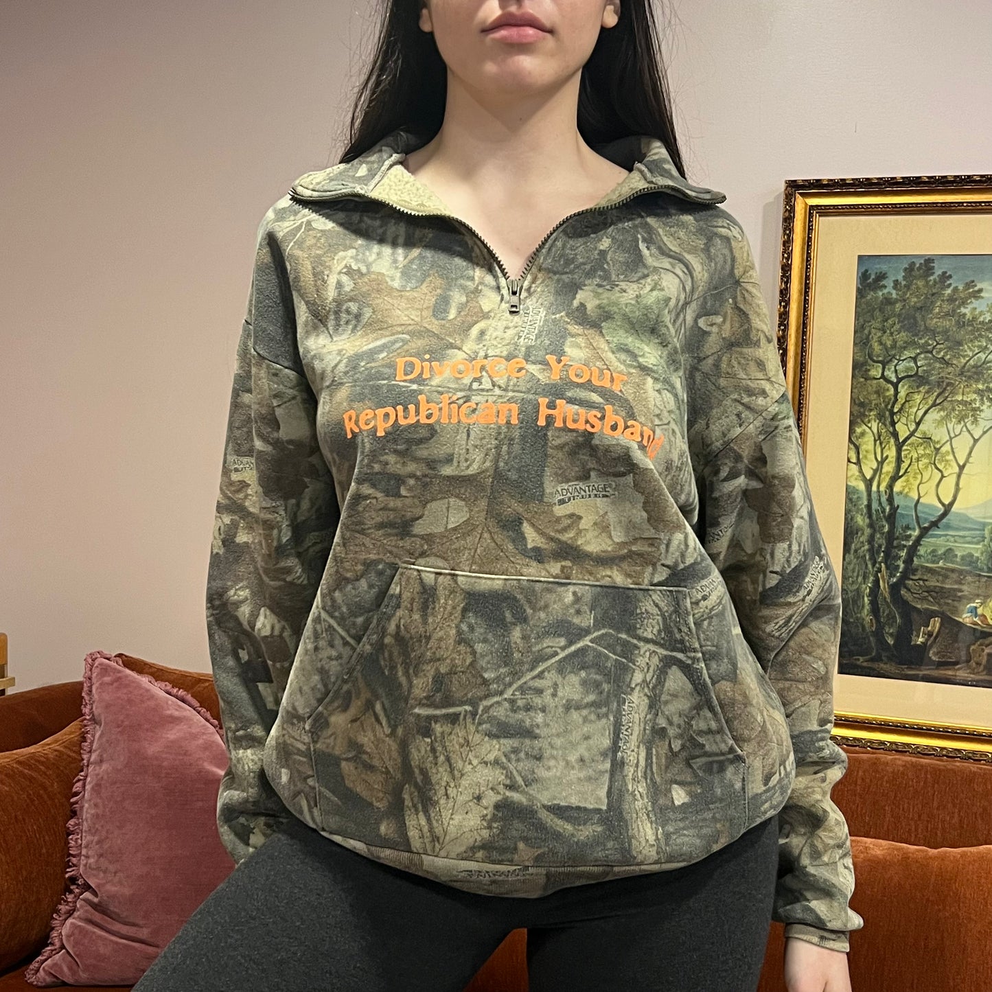 DIVORCE YOUR REPUBLICAN HUSBAND camo zip-up with orange text (L)