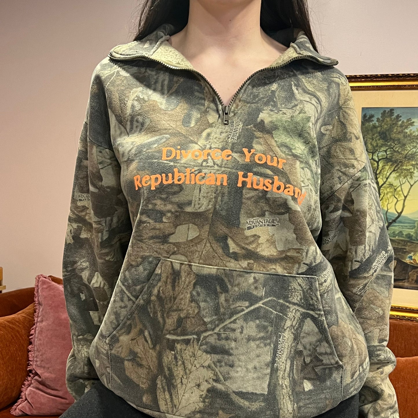 DIVORCE YOUR REPUBLICAN HUSBAND camo zip-up with orange text (L)