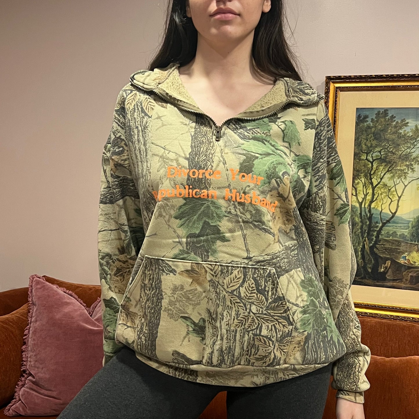 DIVORCE YOUR REPUBLICAN HUSBAND camo zip-up with orange text (L)