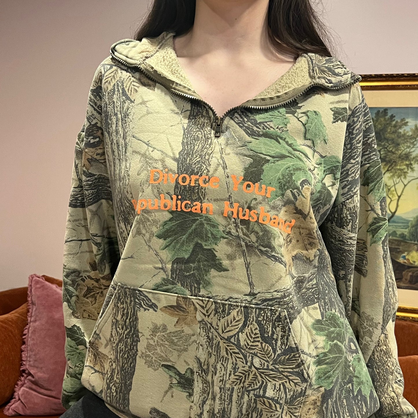 DIVORCE YOUR REPUBLICAN HUSBAND camo zip-up with orange text (L)