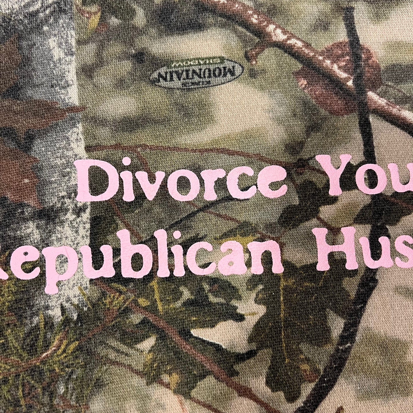 DIVORCE YOUR REPUBLICAN HUSBAND camo hoodie with pink text (M)
