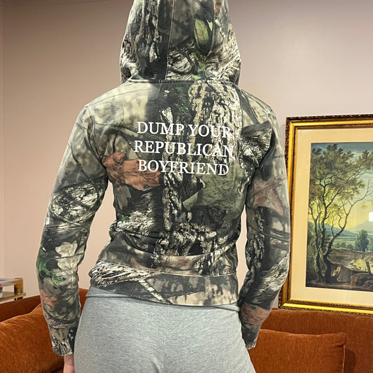 DUMP YOUR REPUBLICAN BOYFRIEND camo jacket with white text (XS)