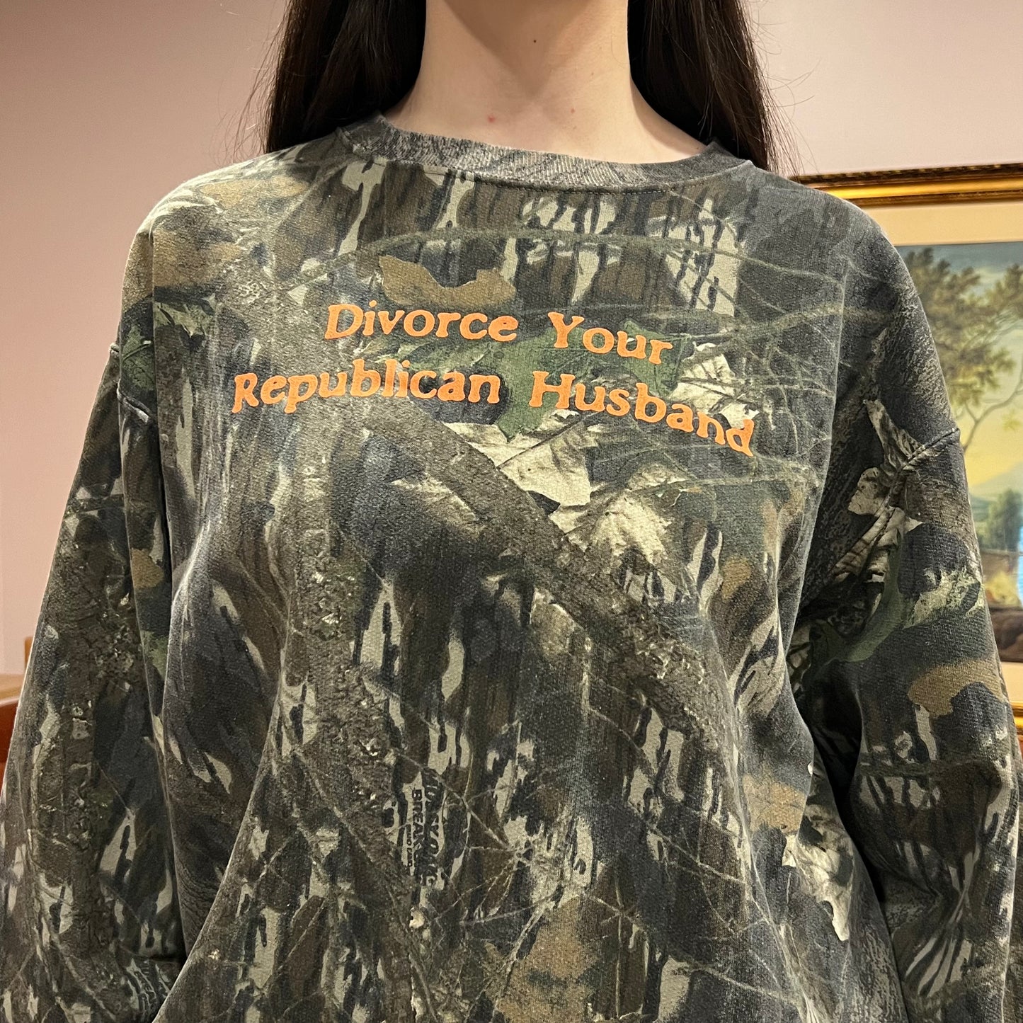 DIVORCE YOUR REPUBLICAN HUSBAND camo crewneck with orange text (XL)