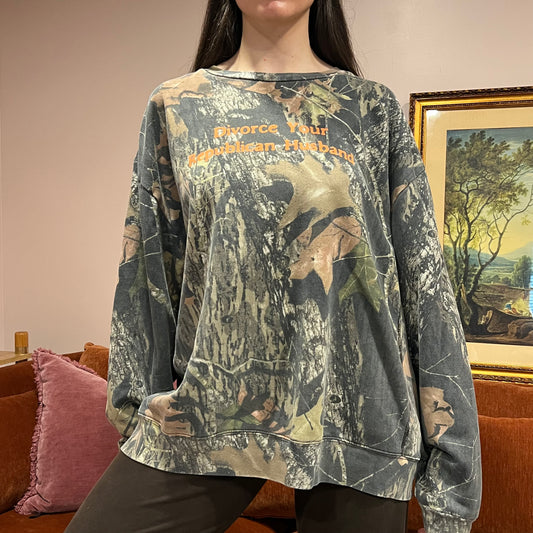 DIVORCE YOUR REPUBLICAN HUSBAND camo crewneck with orange text (2XL)