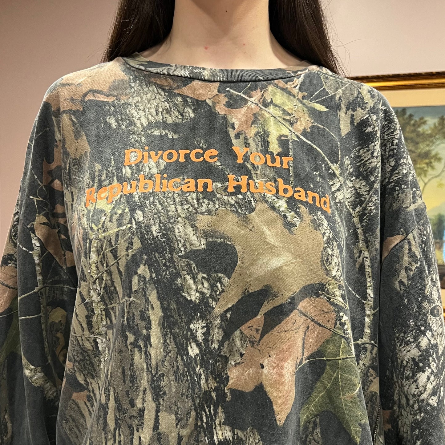 DIVORCE YOUR REPUBLICAN HUSBAND camo crewneck with orange text (2XL)
