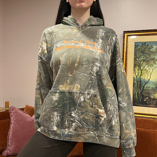 DIVORCE YOUR REPUBLICAN HUSBAND camo hoodie with orange text (XL)