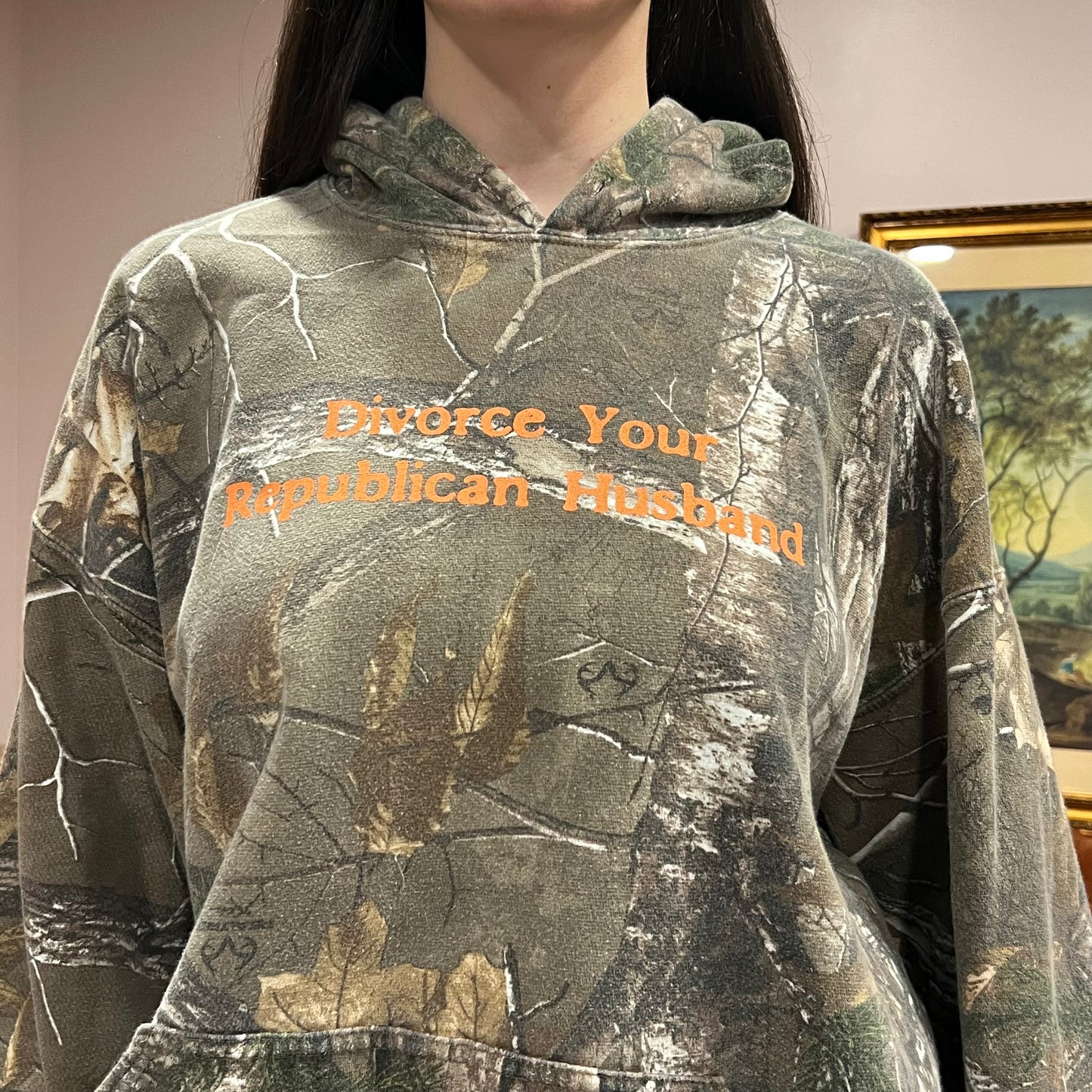 DIVORCE YOUR REPUBLICAN HUSBAND camo hoodie with orange text (XL)