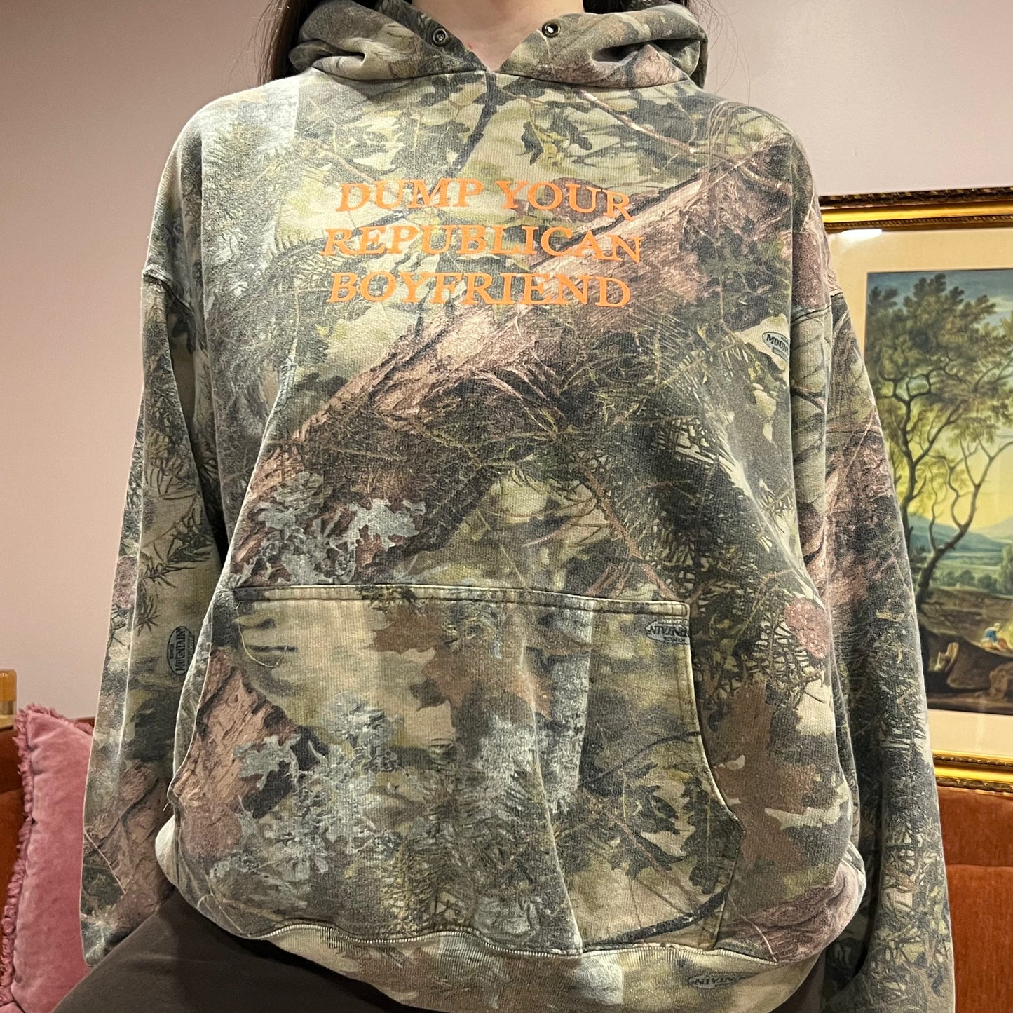 DUMP YOUR REPUBLICAN BOYFRIEND camo hoodie with orange text (XL)
