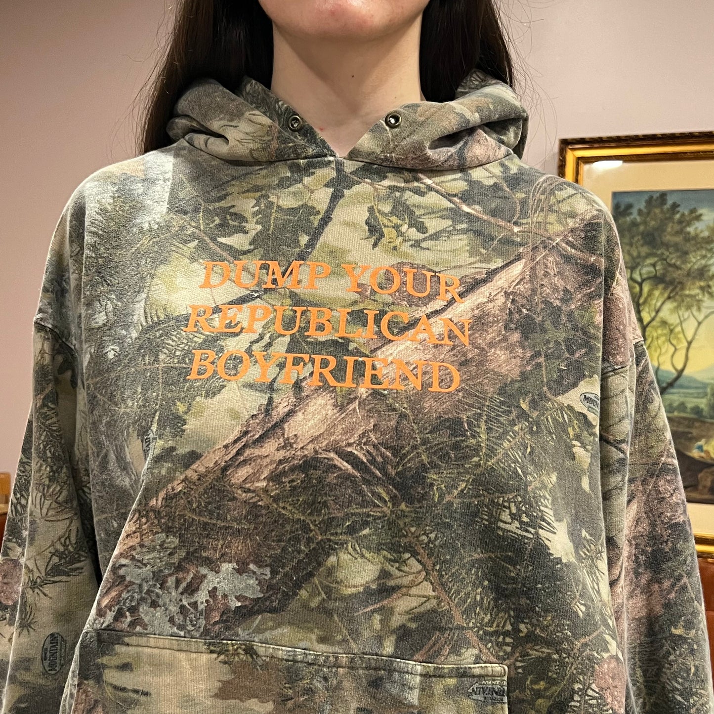 DUMP YOUR REPUBLICAN BOYFRIEND camo hoodie with orange text (XL)
