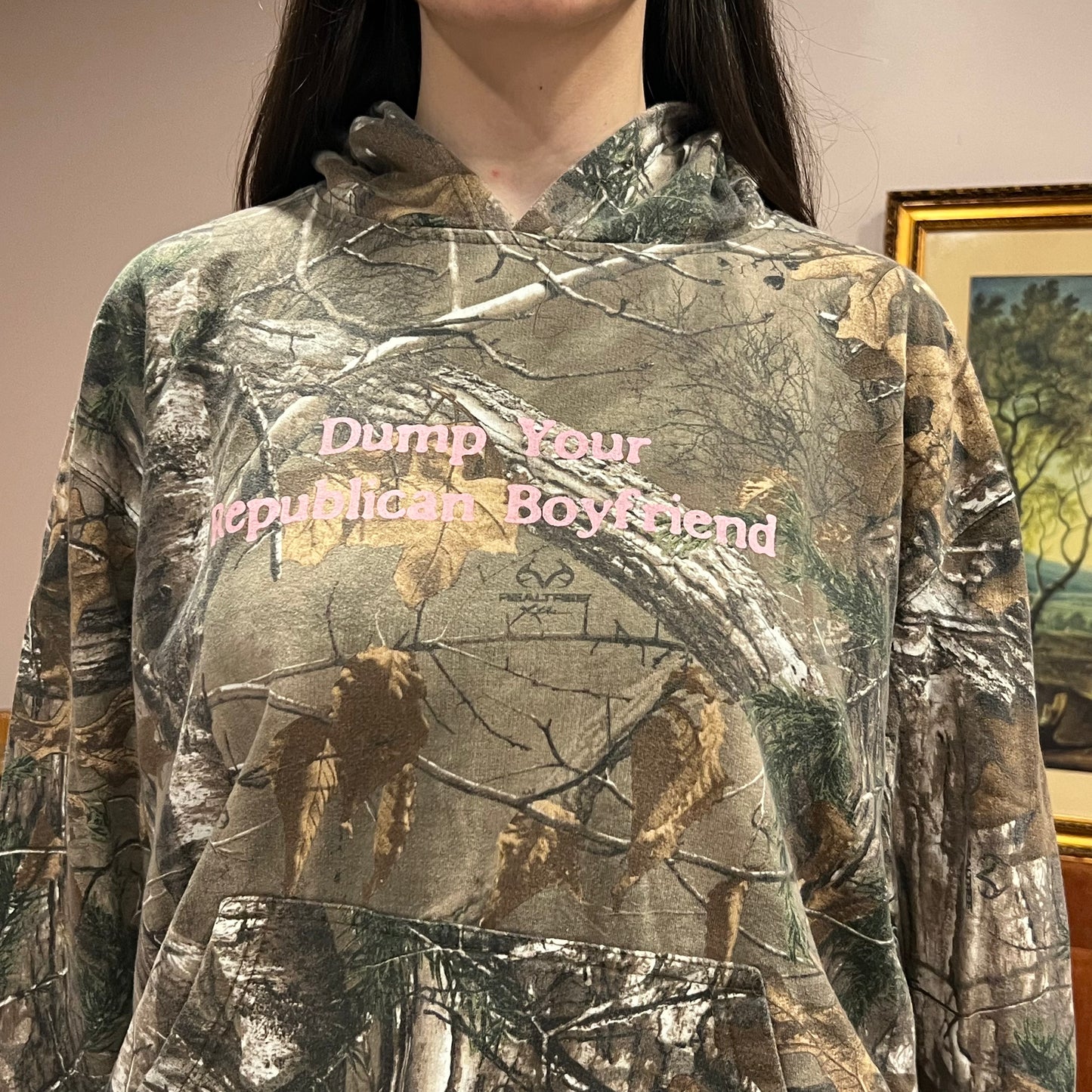 DUMP YOUR REPUBLICAN BOYFRIEND camo hoodie with pink text (XL)