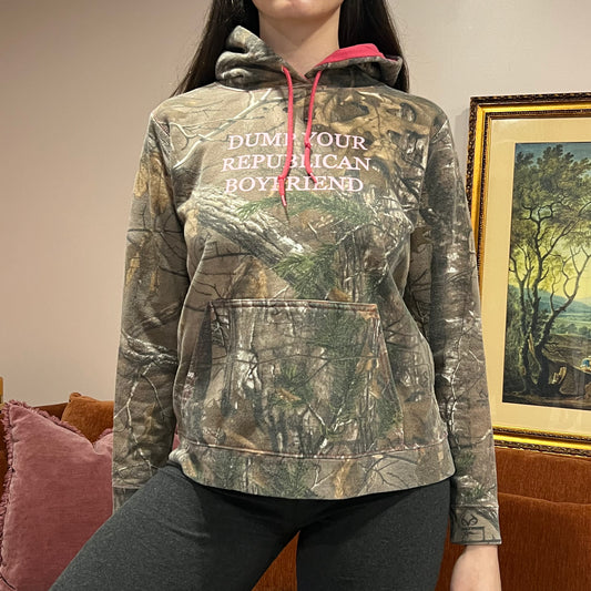 DUMP YOUR REPUBLICAN BOYFRIEND camo hoodie with pink text (M)
