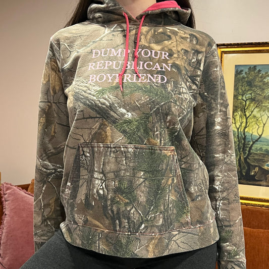 DUMP YOUR REPUBLICAN BOYFRIEND camo hoodie with pink text (M)