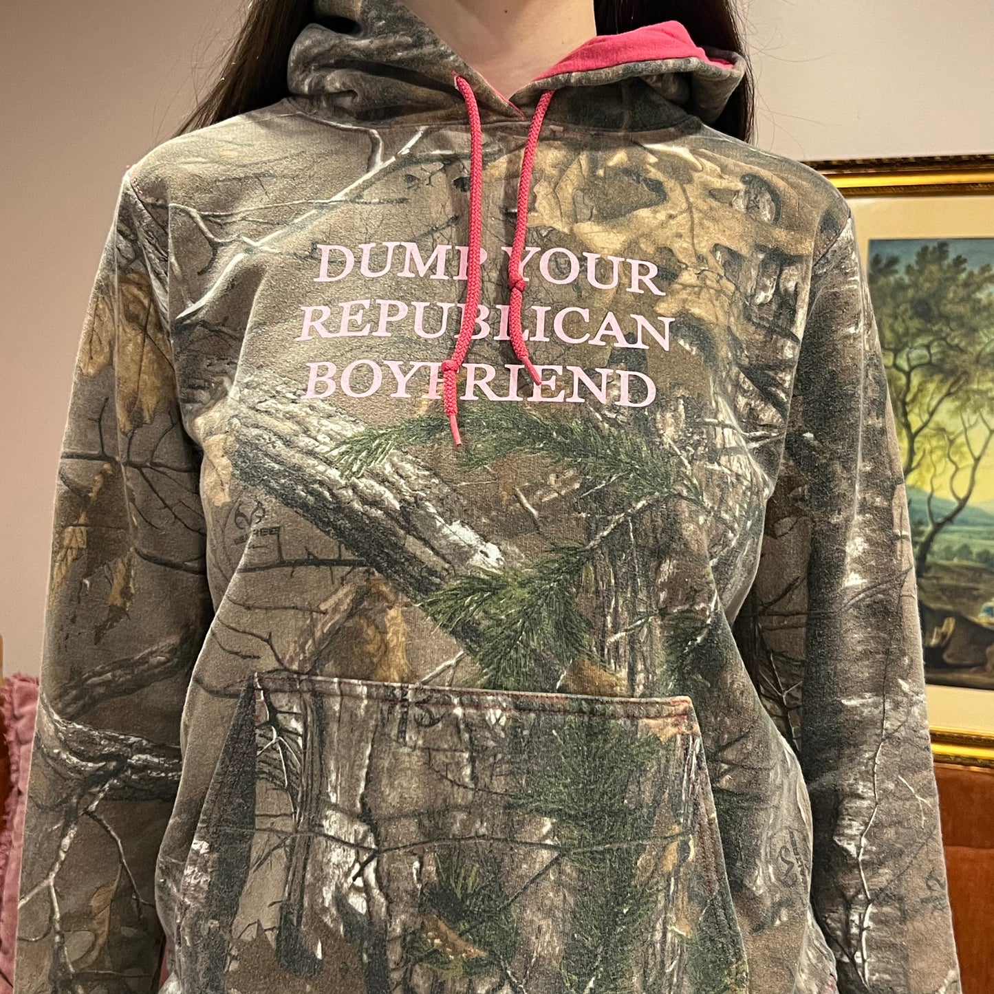 DUMP YOUR REPUBLICAN BOYFRIEND camo hoodie with pink text (M)